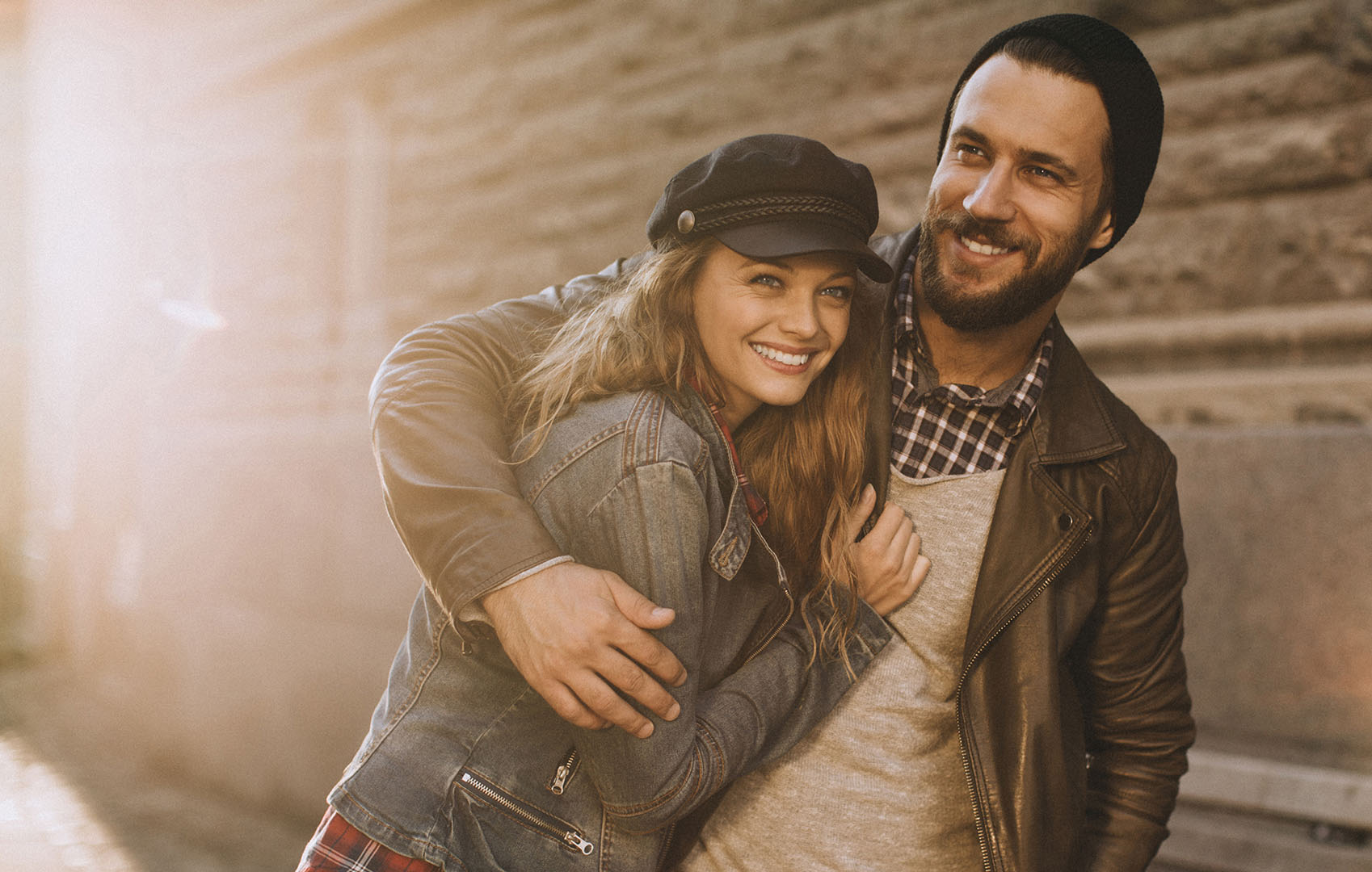 Close up of a happy young couple enjoying city life.